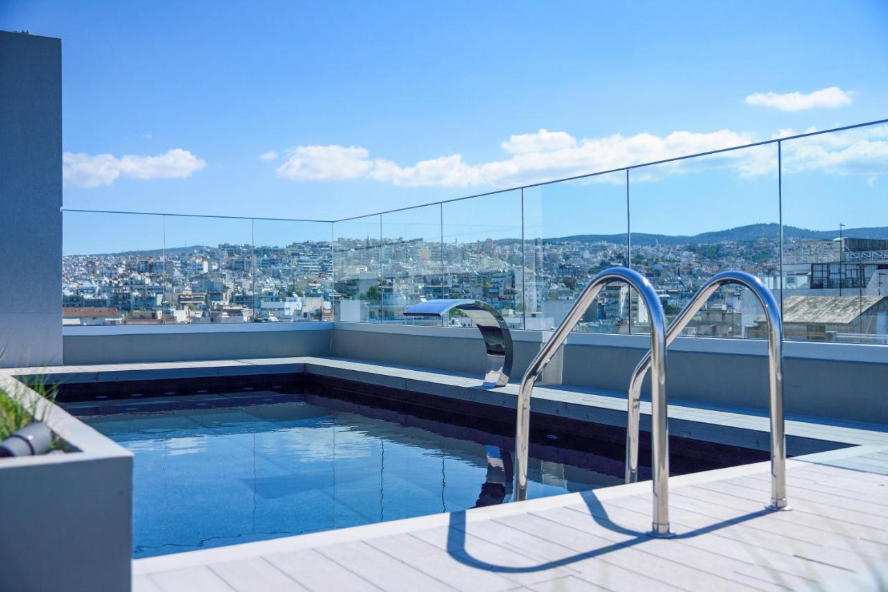 Onoma Hotel Thessaloníki Luaran gambar A pool with a glass balustrade